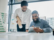 © Lou W/peopleimages.com - Tablet, architecture and collaboration with a business black man architect team working in their office. Building, design or teamwork with a male employee and colleague at work on a development model