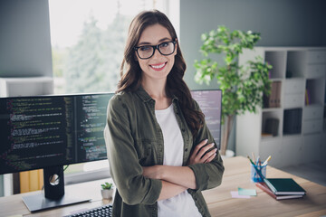 Wall Mural - photo of confident smiling lady admin wear spectacles arms folded creating new application indoors w