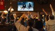 © Gorodenkoff - Group of Friends Watching a Live Ice Hockey Match on TV in a Sports Bar. Excited Fans Cheering and Shouting. Young People Celebrating When Team Scores a Goal and Wins the World Tournament.