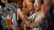 © Gorodenkoff - Portrait of an Excited Young Man Sitting at Bar Counter, Drinking Beer and Using a Smartphone, Anxious About a Sports Bet on His Favorite Soccer Team. Joyful Emotions When Football Team Scores a Goal.