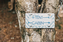 Sign Point To Go To The Tent Or The Cabin