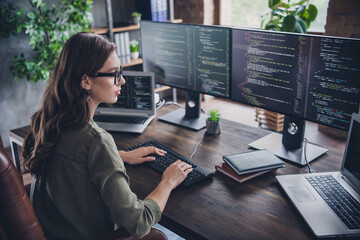 photo of smart concentrated lady web designer write key words download media database upgrade modern