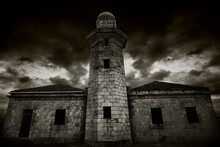 A Contrasted And Dark Image From Punta Nati's Lighthouse, In The Northern Part Of Menorca Island, Spain.