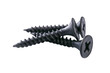 Group of new metal black screws isolated on a transparent background in close-up.