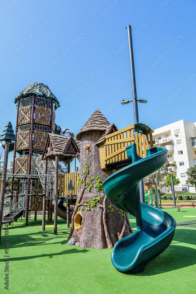 View of children's complex with slide on playground