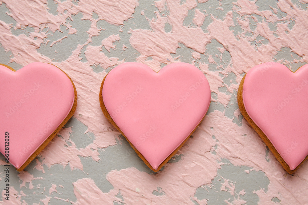 Sweet heart shaped cookies on grunge background, closeup. Valentines Day celebration