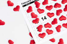 Valentine's Day Concept. Date February 14 On Calendar 2023 On Isolated White Background, Valentines  Day Red Confetti Hearts On A Calendar. Flat Lay, Top View, Copy Space