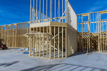 Wall Mural - Framework beams of under construction new house being built in residential building construction