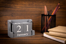 21 January Inscription On Wooden Calendar. Wooden Office Desk