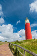 Leuchtturm vor blauen Himmel auf Texel