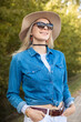 © Татьяна Волкова - Vertical modern glad smiling carefree blond woman in sunglasses and hat joy trip holiday adventure in nature. Travelling