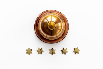 Hotel service bell with five golden stars, top view