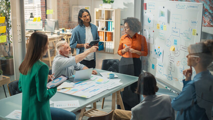 Poster - Diverse Modern Office: Black Businesswoman Leads Business Meeting with Managers, Talks, Explains Statistics, Uses a Whiteboard with Graphs, Big Data. Digital Entrepreneurs Work on eCommerce Project