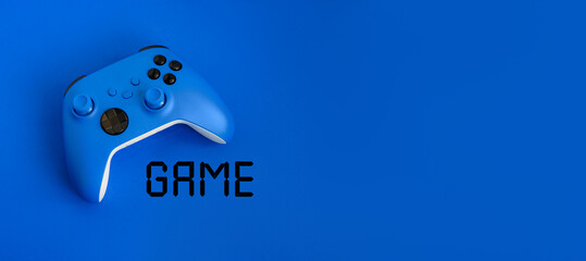 Wall Mural - Banner blue background with blue gamepad, Testk 