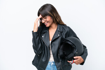 Wall Mural - Young caucasian woman with a motorcycle helmet isolated on white background laughing