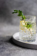 © ADDICTIVE STOCK - Glass of pure water with lemon and mint