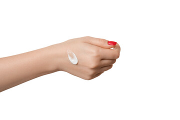 Wall Mural - A drop of cream on a female hand, isolate on a white background.