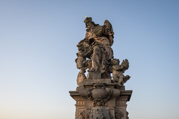 Wall Mural - Statue of Saint Ludmila at Charles Bridge - Prague, Czech Republic