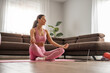 © ivanko80 - Woman practicing yoga at home
