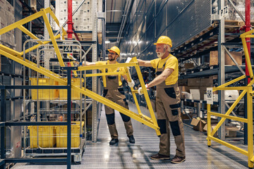 Wall Mural - Warehouse workers preparing a delivery