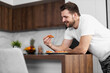 © ivanko80 - Man having breakfast in the kitchen
