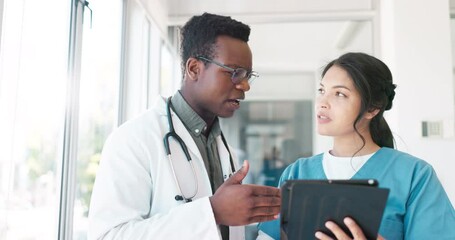 Wall Mural - Healthcare team, discussion and tablet with a doctor and nurse talking about medicine research. Black man and woman hospital staff meeting using technology for planning, communication and innovation