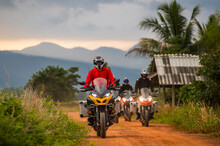 Bikers Riding Motorcycles On Empty Dirt Road Toward Camera,Â ChiangÂ Mai,Â MueangÂ Chiang Mai District, Thailand