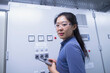 © Cavan Images - Young female engineer updating control panel using digital tablet in an industrial plant, Freiburg im Breisgau, Baden-Württemberg, Germany