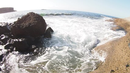 Wall Mural - water flowing into the water