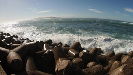 Wall Mural - waves crashing on rocks