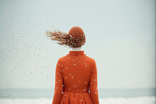 Generative AI Minimalist Illustration Of A Woman On The Beach On A Cloudy Day Looking At The Sea And With Her Hair Moved By The Wind. Conceptual And Surreal Artwork