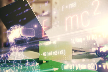 Desktop computer background and formula hologram writing. Double exposure. Education concept.