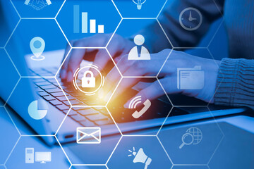 Wall Mural - business people hand working on laptop computer with virtual graphic business data information diagram, internet security, network connection, investment financial and digital technology concept