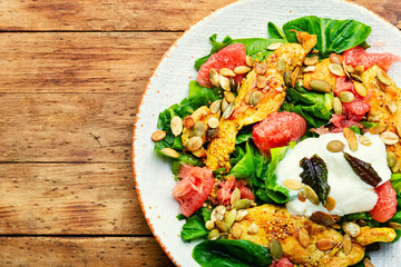 Wall Mural - Fresh salad with chicken breast, herbs and grapefruit