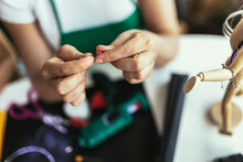 Close Up Photo Designer Making Handmade Jewelry In Studio Workshop. Fashion, Creativity And Handmade Concept.
