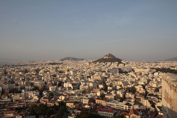  looking over the city of Athens greece on a perfect summers morning. Clear skies no polution