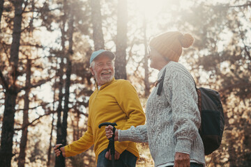 Portrait close up head shot of one cheerful smiling middle age woman walking with her husband enjoying free time and nature. Active beautiful seniors in love together at sunny day.