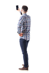 back view of adult man taking photo or selfie with smartphone. full body isolated on transparent bac