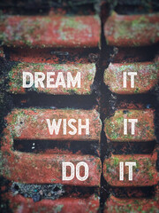 Wall Mural - Motivational and Inspirational Concept - dream it wish it do it text in vintage background. Stock photo.