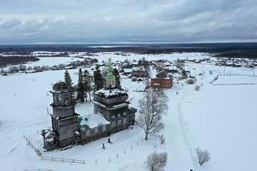 Wall Mural - wooden church winter top view, landscape russian north architecture