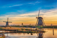 Rotterdam Netherlands, Sunrise Nature Landscape Of Dutch Windmill At Kinderdijk Village