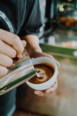 Wall Mural - pouring milk for making latte art coffee