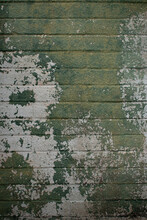Cinder Block Wall With Green Peeling Paint