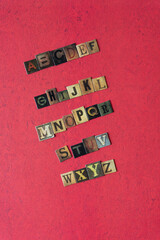 Poster - alphabet composed of chipboard tiles displaying vintage style letters