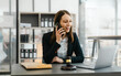 © NanSan - Highly skilled female recruiter consulting online on laptop in office meeting white lawyer or financial advisor convene law in video conferencing and audio calls on social media applications.