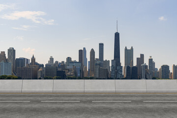 Empty urban asphalt road exterior with city buildings background. New modern highway concrete construction. Concept of way to success. Transportation logistic industry fast delivery. Chicago. USA.