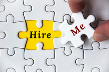 Hire Me Text On Missing Jigsaw Puzzle. Employment And Hiring Concept