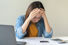 Financial Owe, Hand Of Asian Woman Sitting, Holding Credit Card, Stressed  By Calculate Expense From Invoice Or Bill, No Money To Pay, Mortgage Or Loan. Debt, Bankruptcy Or Bankrupt.