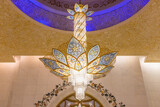 Fototapeta Sawanna - Close up of a huge crystal chandelier in Sheik Zayed mosque in Abu Dhabi