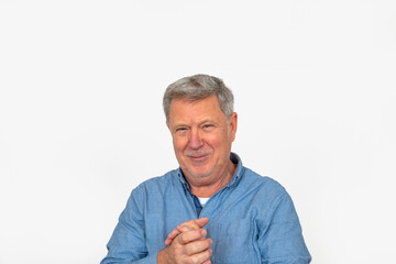 portrait of positive looking caucasian mature man with gray hair